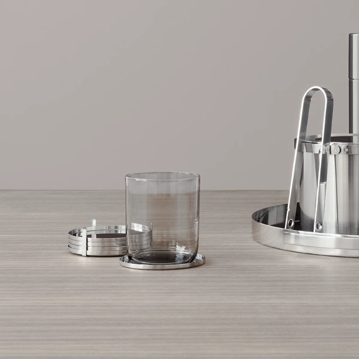 ARNE JACOBSEN COASTER SET - STAINLESS STEEL