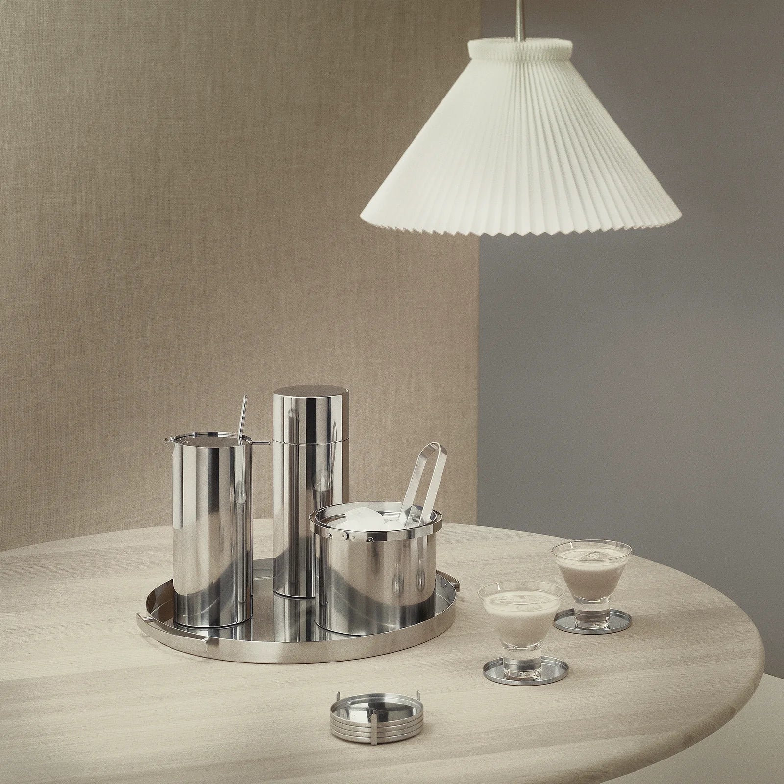 ARNE JACOBSEN COASTER SET - STAINLESS STEEL